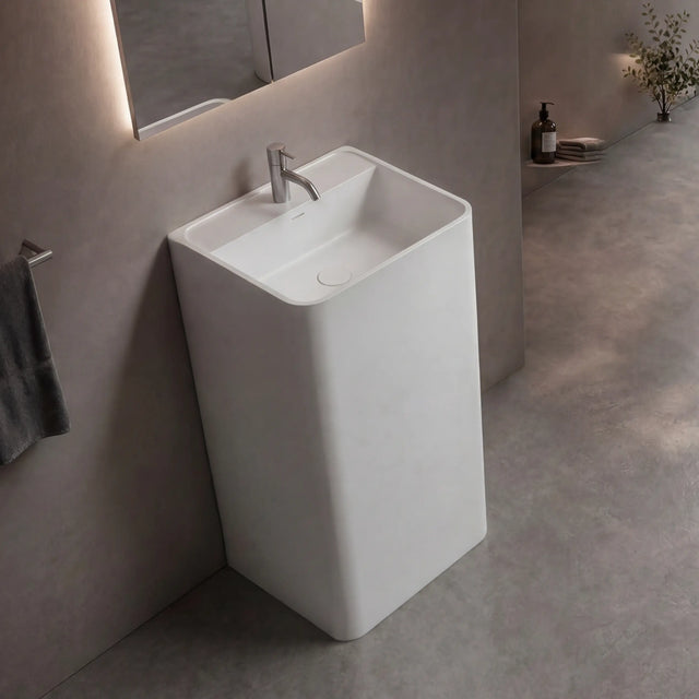 Modern bathroom with a freestanding sink and bathtub.