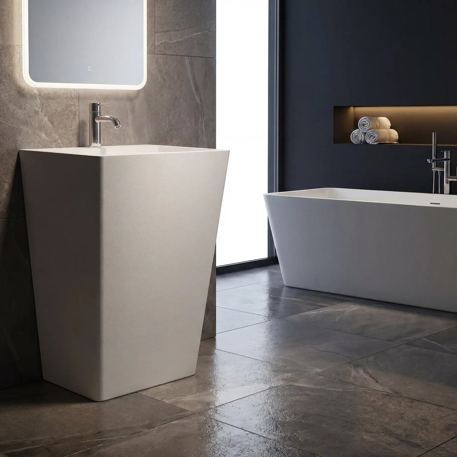 Modern bathroom with a freestanding sink and bathtub.