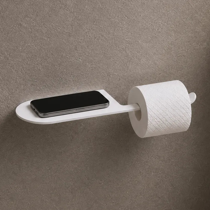 Wall-mounted toilet paper holder with smartphone tray in a bathroom setting.