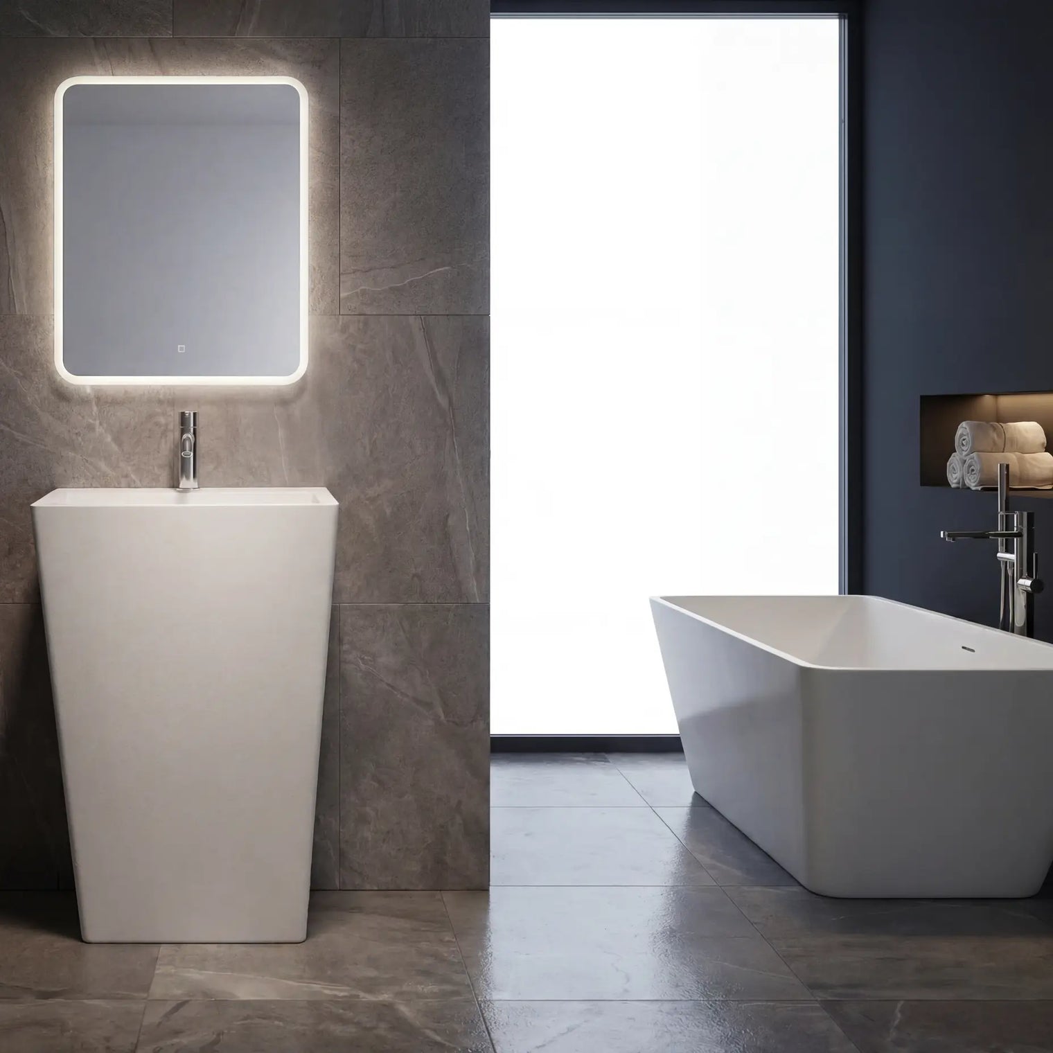 Modern bathroom with a freestanding bathtub and sink against a dark tiled wall.