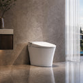 Modern Smart toilet in a bathroom with a scenic view of a house by the water.